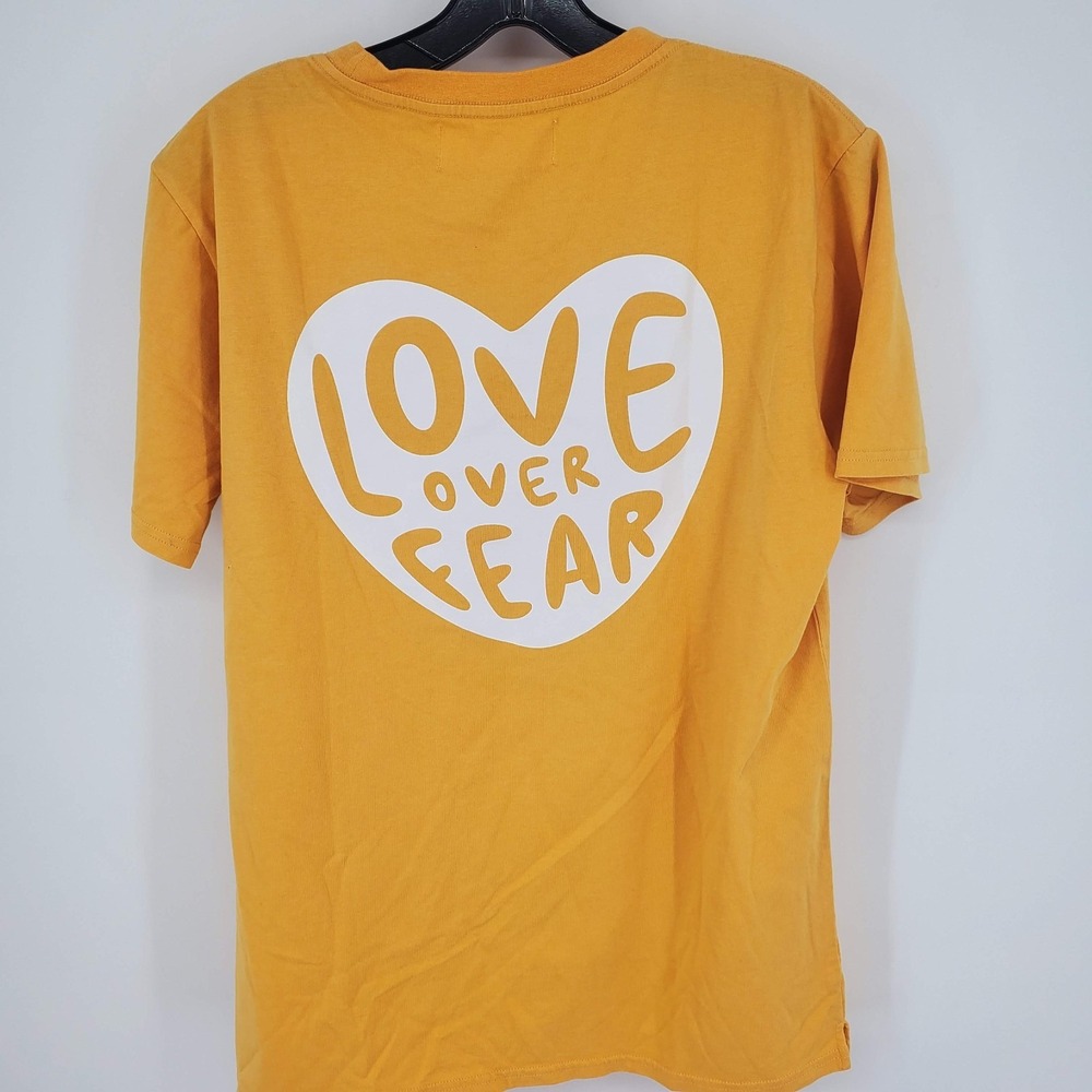 Seek Discomfort Buttercup Yellow Love over Fear Men Women Graphic T Shirt Med